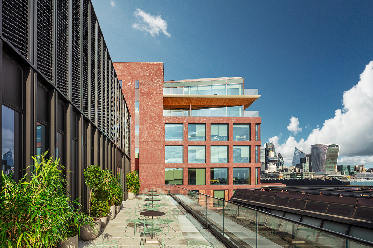 Rooftop terrace at MYO Bankside overlooking London's skyline with outdoor seating and planting.