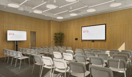 Bright conference room which holds up to 50 people