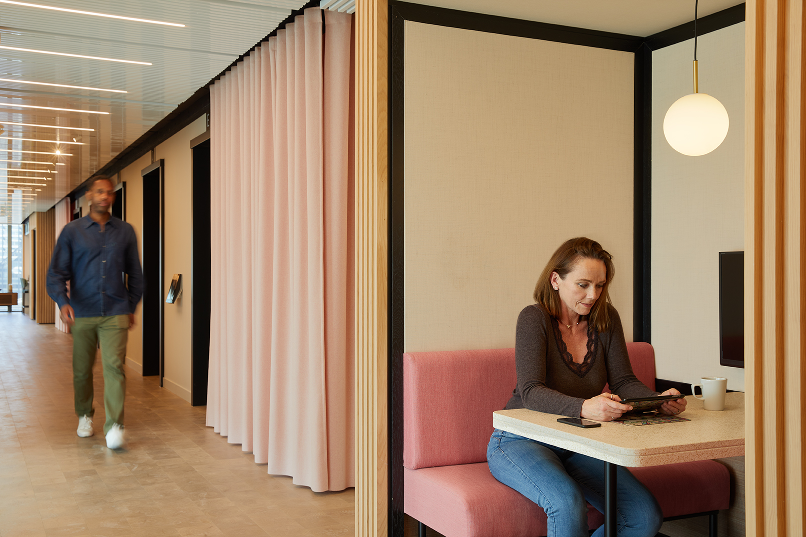 Private booth at MYO Liverpool Street featuring blush pink upholstered seating, soft lighting and semi-enclosed surroundings designed for focused work or informal meetings.