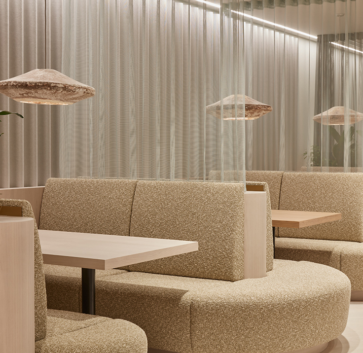 Large, cream-coloured breakout booths