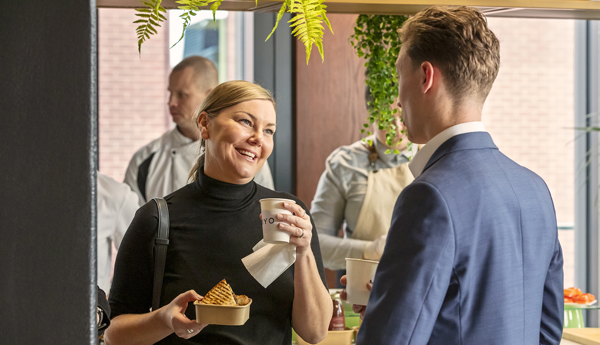 Guests enjoying refreshments and conversation during a catered networking event at MYO Bankside.
