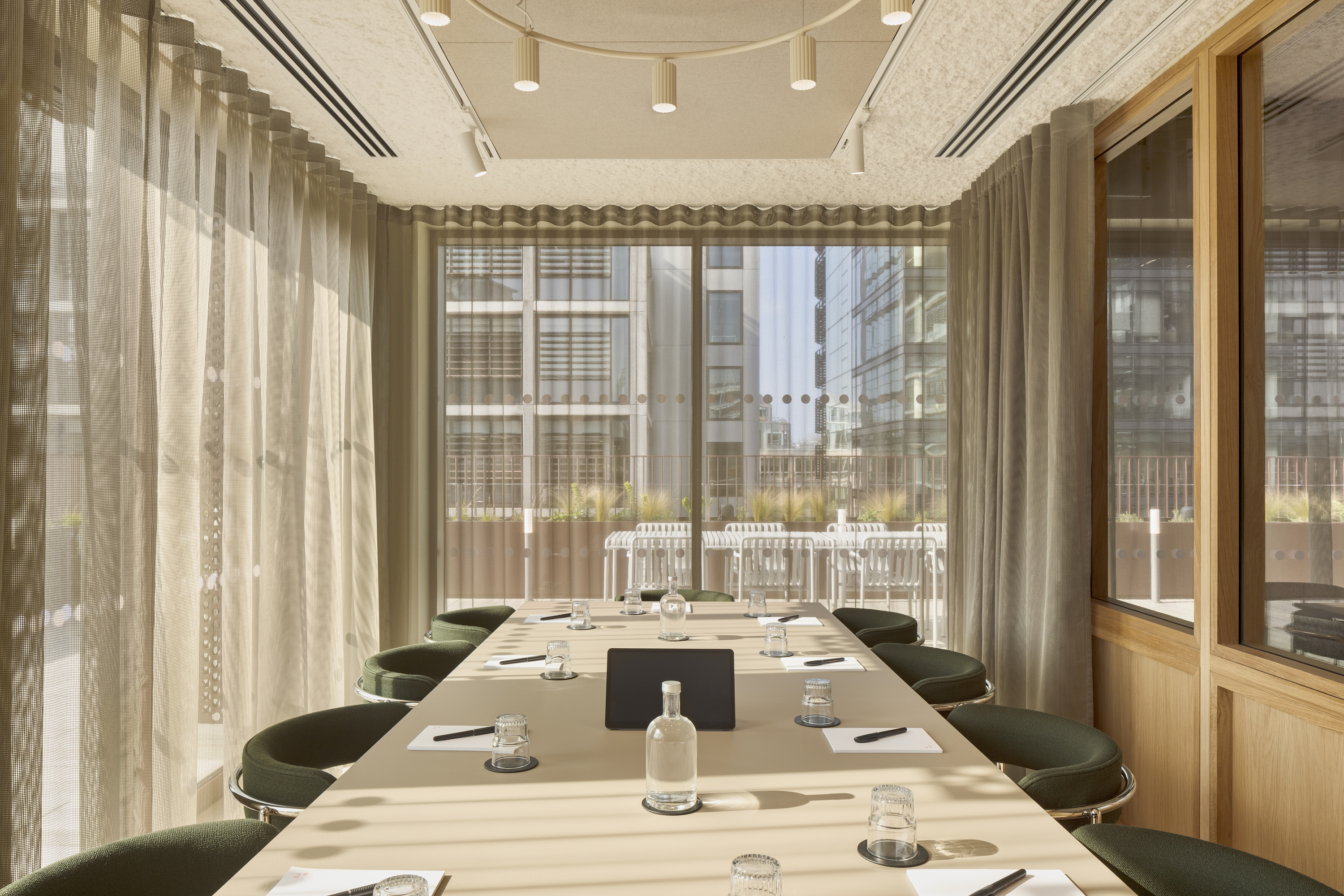 Stylish, secluded meeting room adjacent to outdoor terrace space.