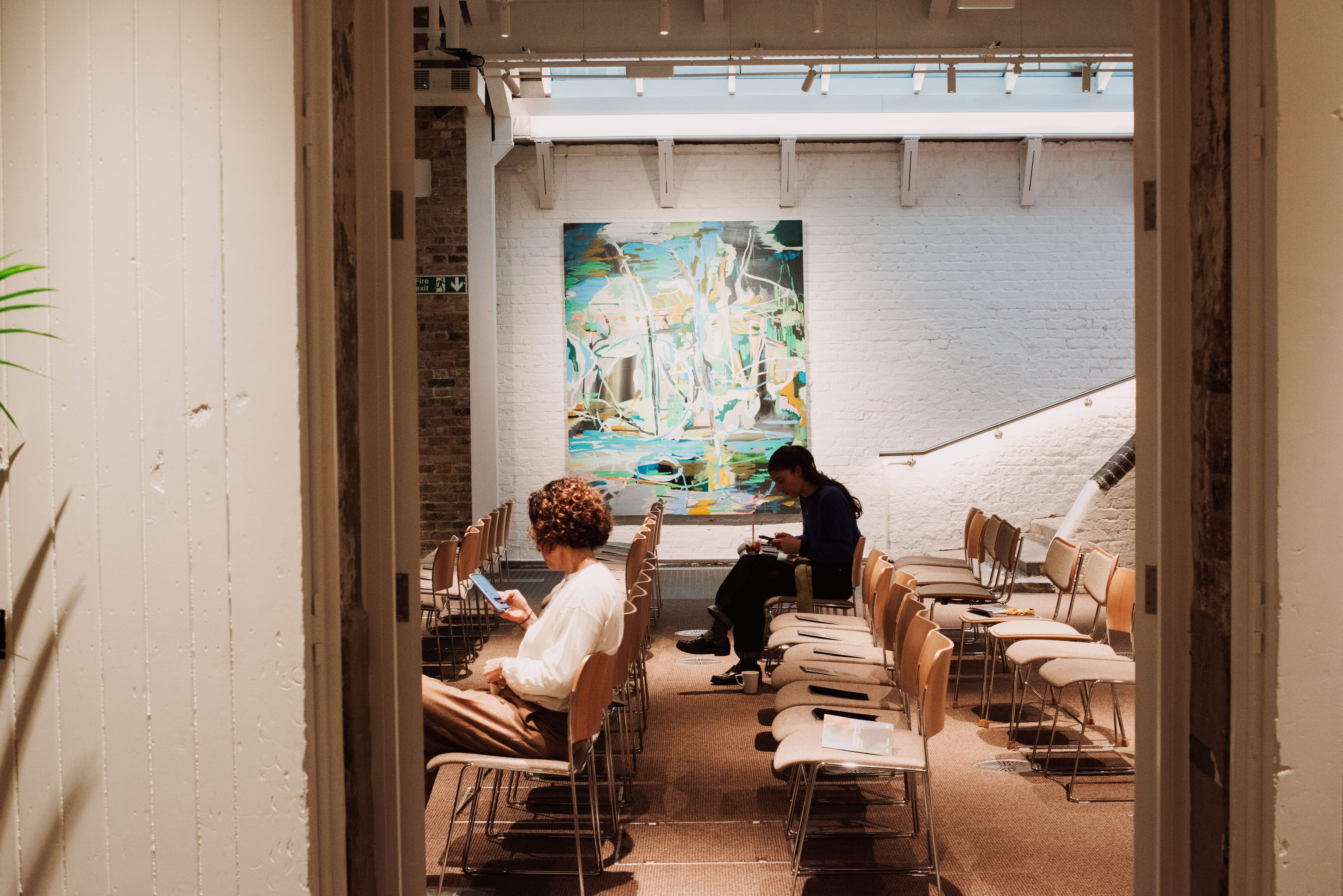 Bright conference space with a pop of modern art